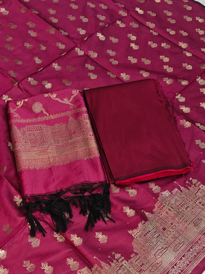 Banarasi soft silk suit in rani colour with temple design work
