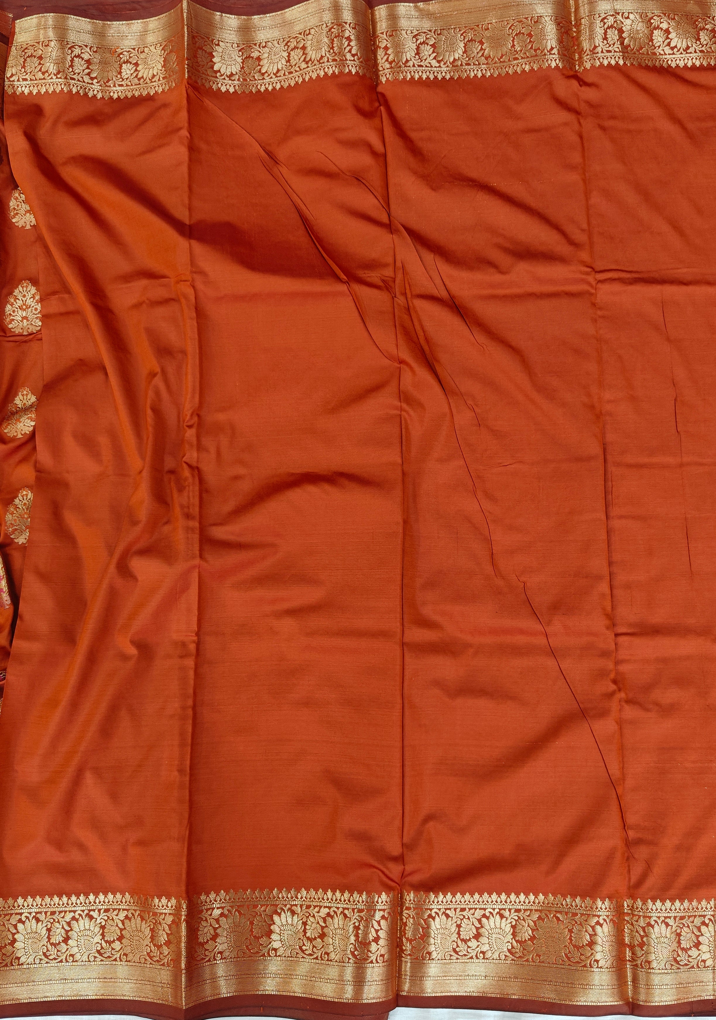 Banarasi katan by katan silk saree in orange colour with multiple meenakari work