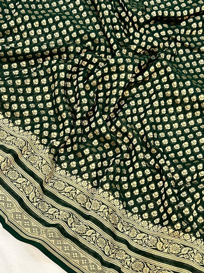 Pure georgette banarasi saree in bottle green colour with antic zari work