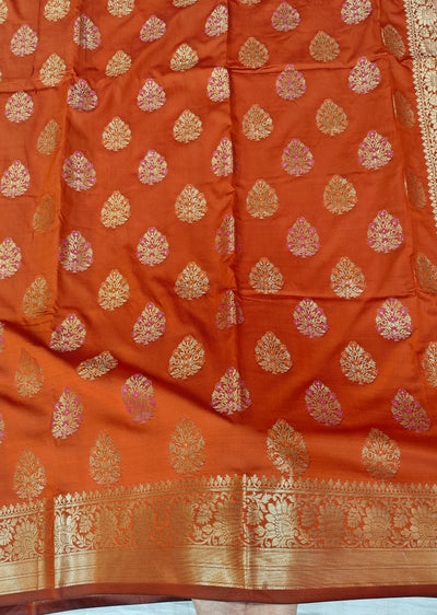 Banarasi katan by katan silk saree in orange colour with multiple meenakari work