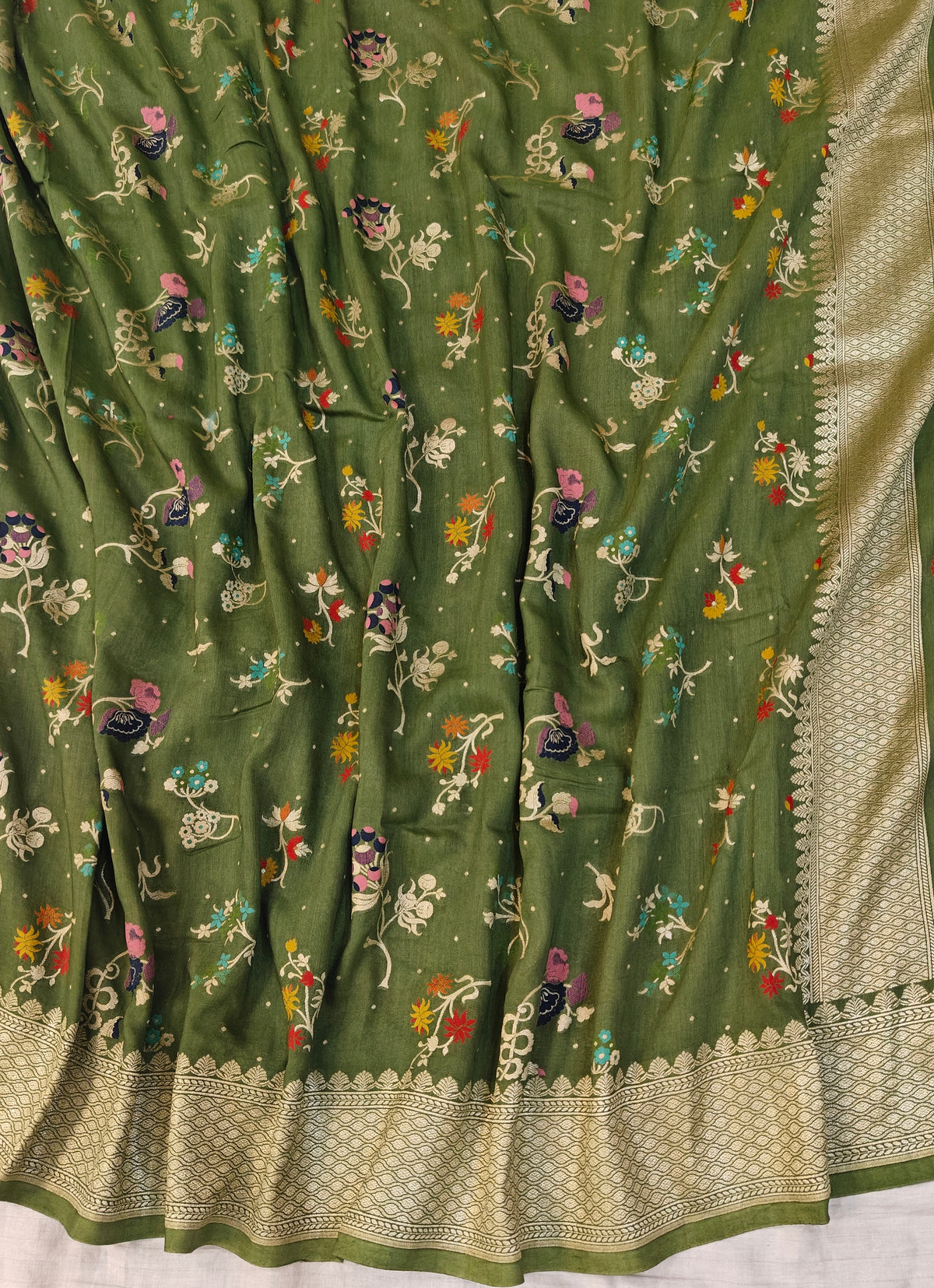 Premium Pure moonga banarasi saree in green colour with multiple meenakari work
