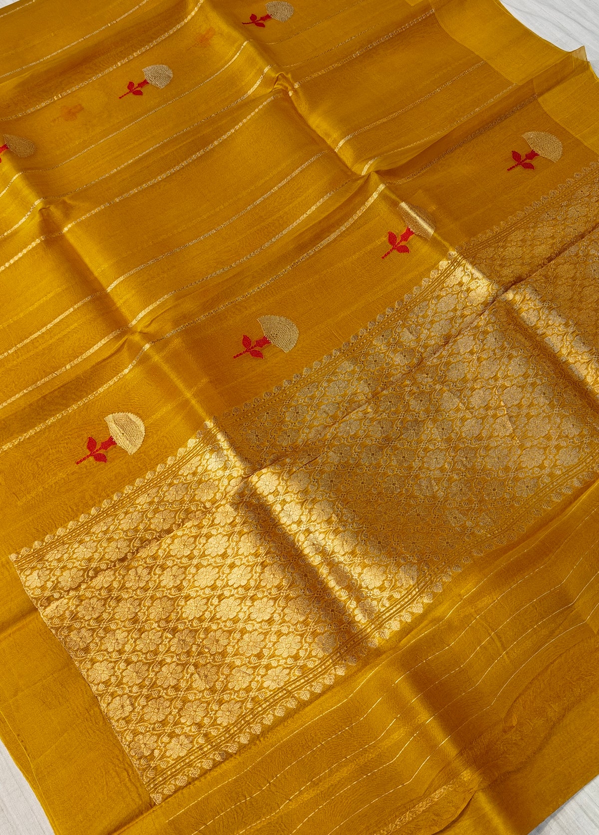Pure handloom kora silk saree in stripes design with meenakari work in mustard colour