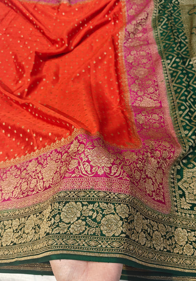 Pure khaddi crepe silk saree with 3D border in orange Rani & bottle green colour combination
