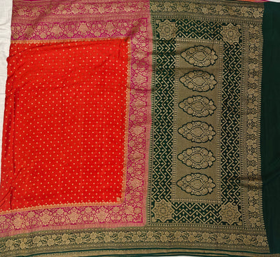 Pure khaddi crepe silk saree with 3D border in orange Rani & bottle green colour combination