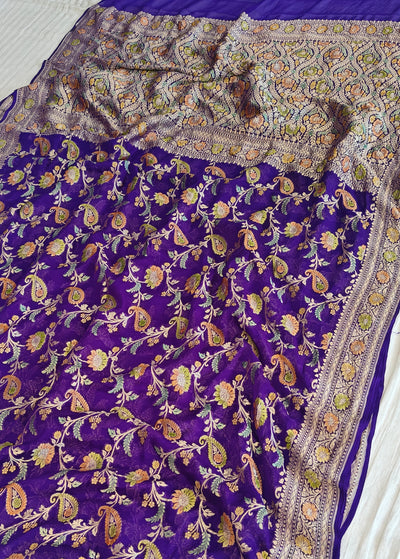 Pure georgette banarasi saree in purple colour with handbrush paint work
