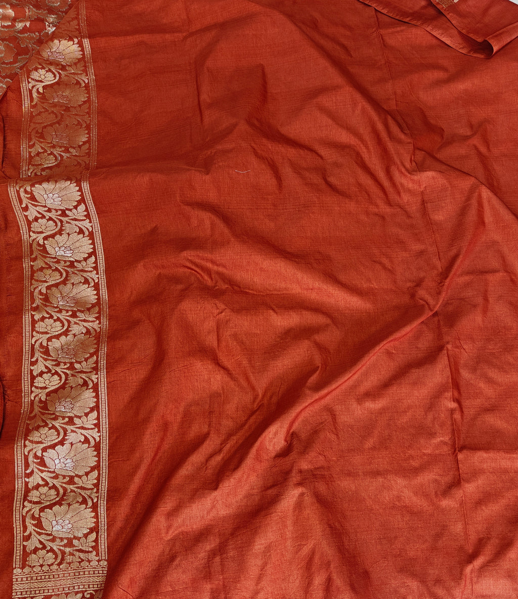 Banarasi georgette silk saree in rust orange colour with sonarupa detailing