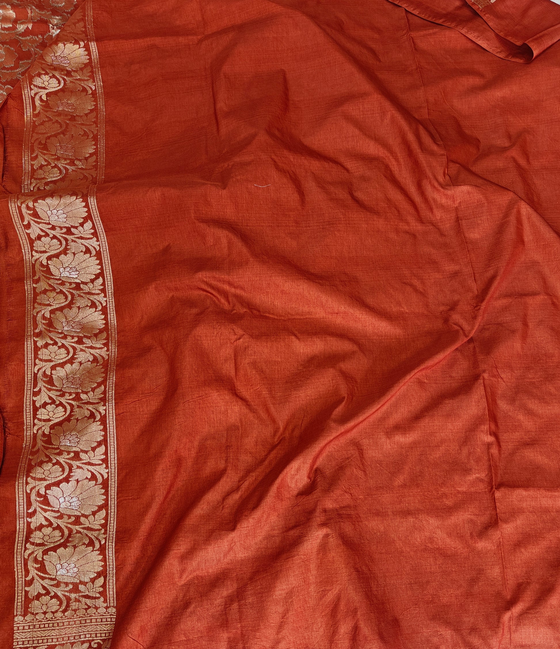 Banarasi georgette silk saree in rust orange colour with sonarupa detailing