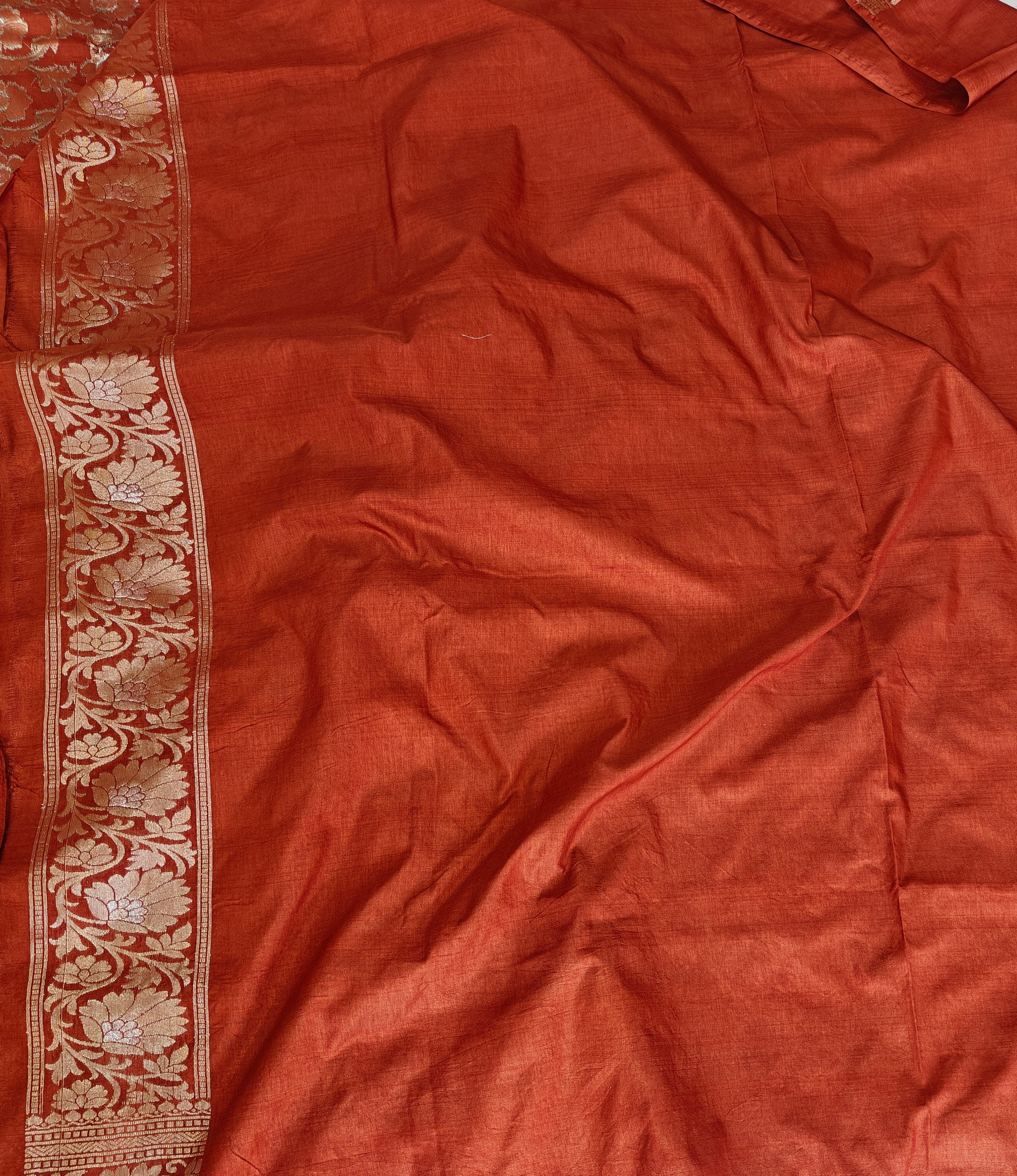 Banarasi georgette silk saree in rust orange colour with sonarupa detailing